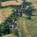 Chlum (v pozadí) a jeho část na Chlumské (v popředí)